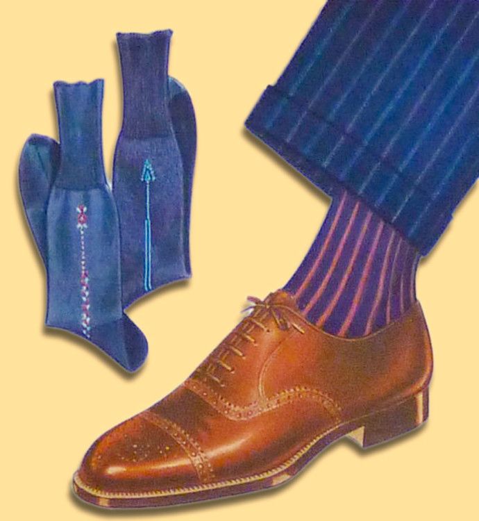 Ребристые красные и синие носки создают хорошую комбинацию между коричневыми туфлями и тёмным костюмом