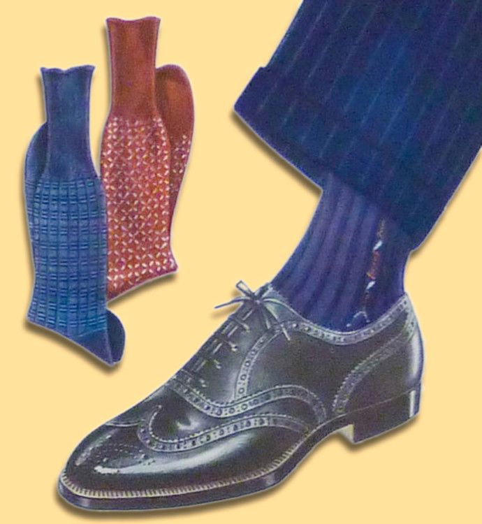 Тёмно-синие полосатые носки в контрастных цветах отлично подойдут к черным оксфордам